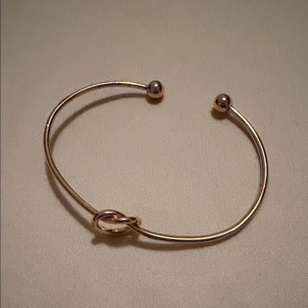Elegant Silver Knot Bangle Bracelet